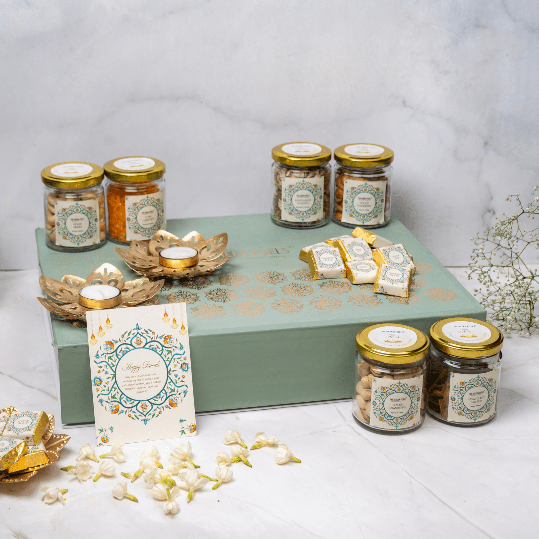 Diwali treasure chest gift box with dark chocolates, dry fruits, saffron mishri and gold lotus diya by TGF