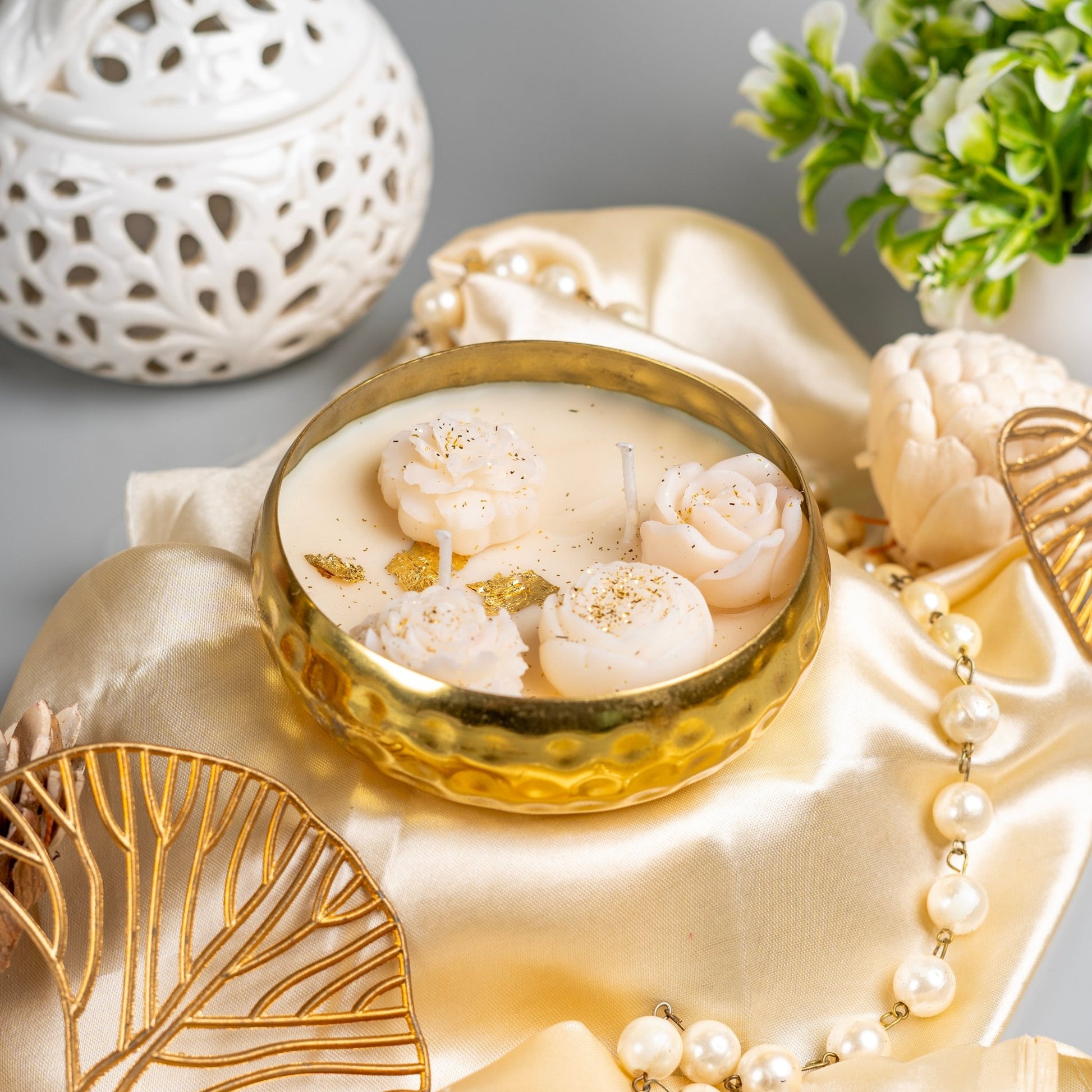 Golden bloom urli candle – gold plated with floral décor and divine fragrance by The Green Fuels
