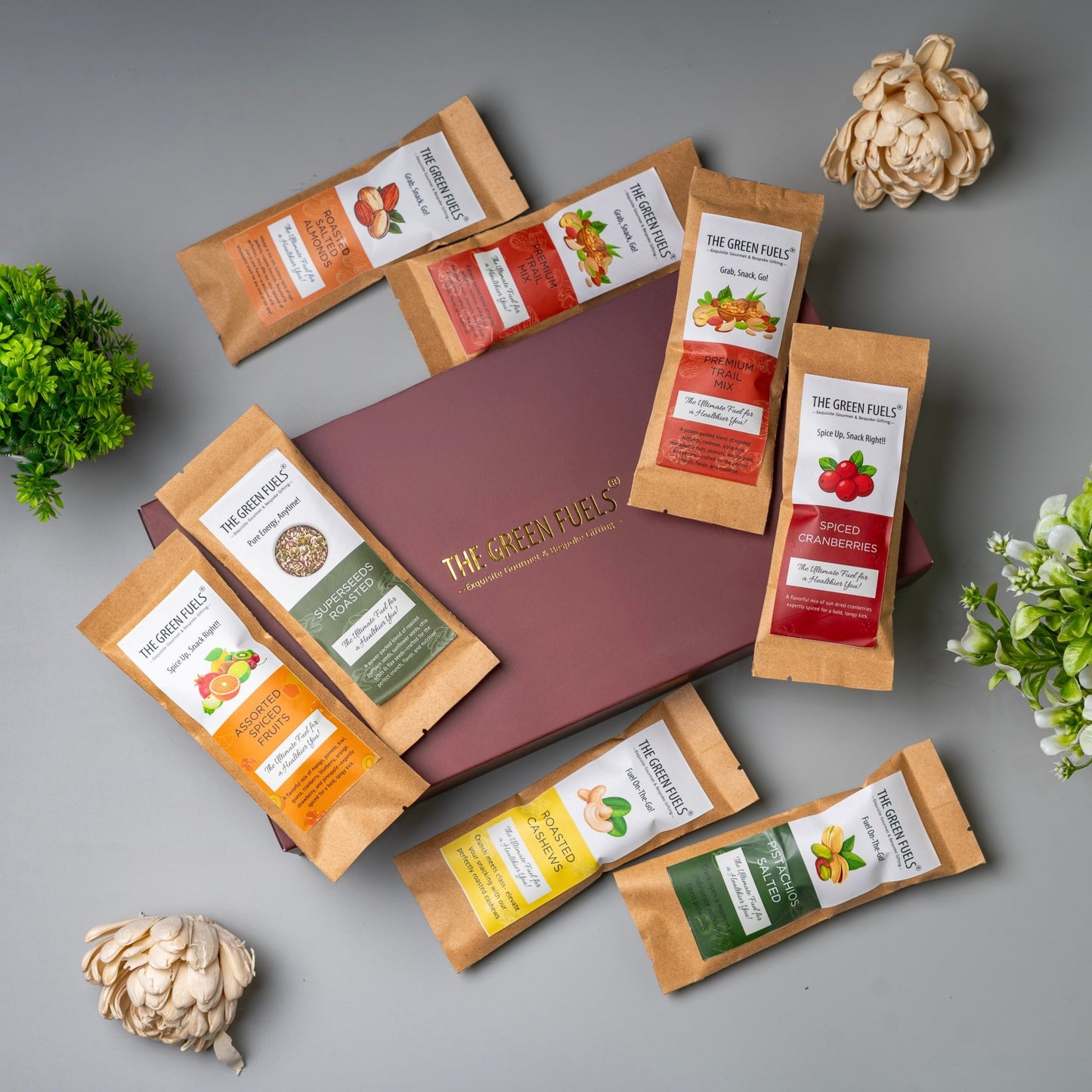 Grab and go travel munch box with 8 premium snack packs for travel and work by The Green Fuels