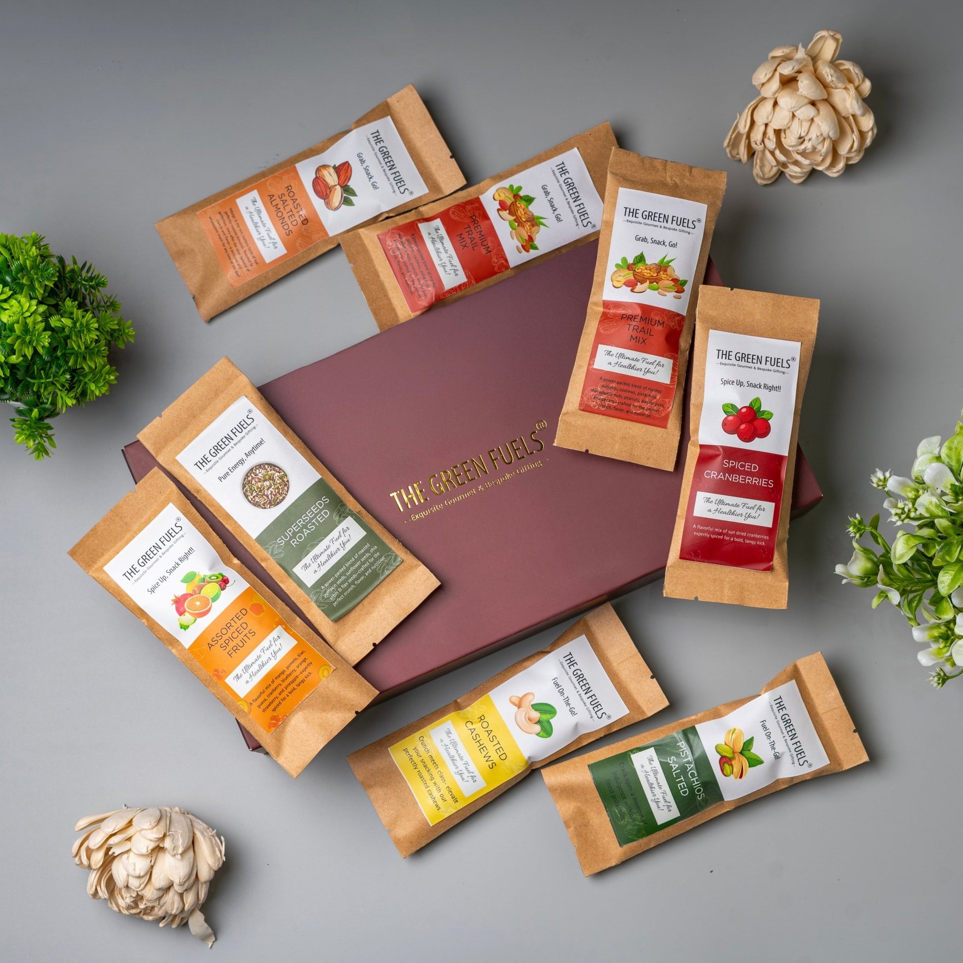 Grab and go travel munch box with 8 premium snack packs for travel and work by The Green Fuels